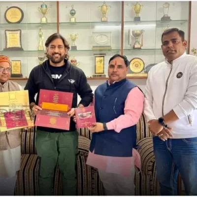 MS Dhoni holds the special invitation for Ayodhya's Ram Temple 'Pran Pratishtha' ceremony, presented by RSS and BJP leaders, symbolizing inclusivity and significance in Indian cricket.