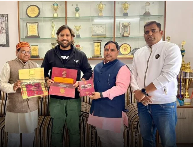 MS Dhoni holds the special invitation for Ayodhya's Ram Temple 'Pran Pratishtha' ceremony, presented by RSS and BJP leaders, symbolizing inclusivity and significance in Indian cricket.