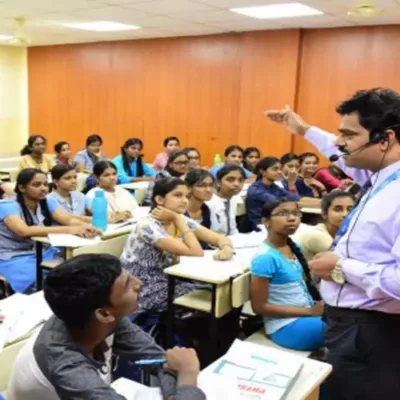 Students studying in a coaching center.