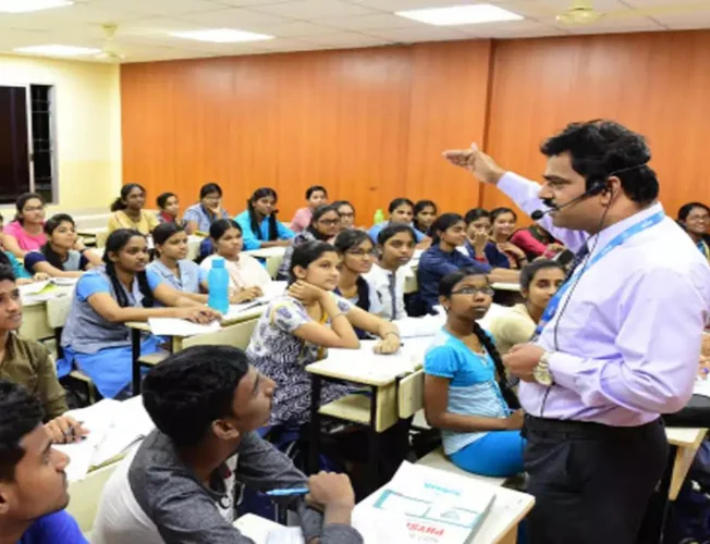 Students studying in a coaching center.