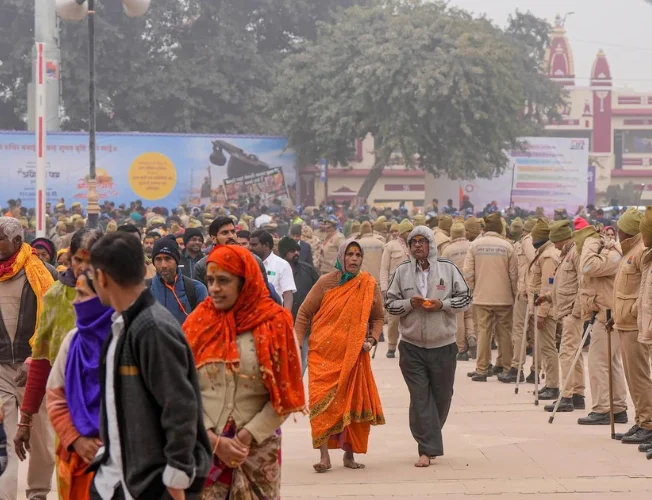 Crowd management personnel overseeing the sealed borders of Ayodhya during the consecration of the Ram Mandir.