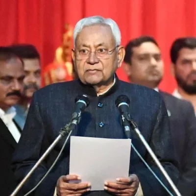 Nitish Kumar taking oath as Bihar Chief Minister in the presence of Governor Phagu Chauhan.