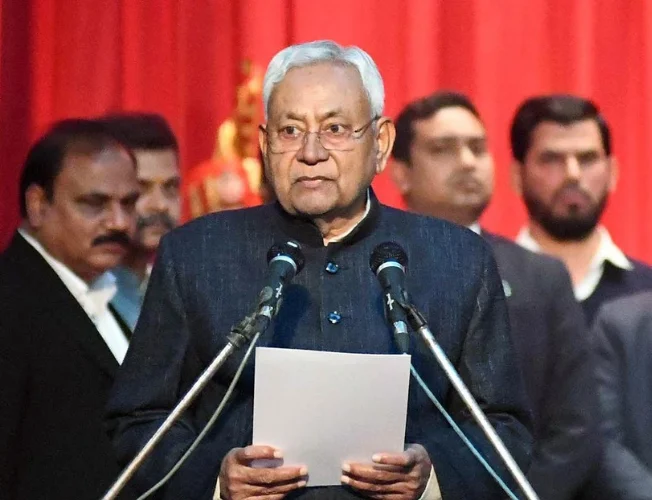 Nitish Kumar taking oath as Bihar Chief Minister in the presence of Governor Phagu Chauhan.