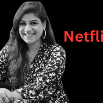 Poornima Sharma, Head of Marketing Partnerships at Netflix India, poses confidently. She is wearing professional attire and smiling, reflecting her leadership role in the streaming industry.