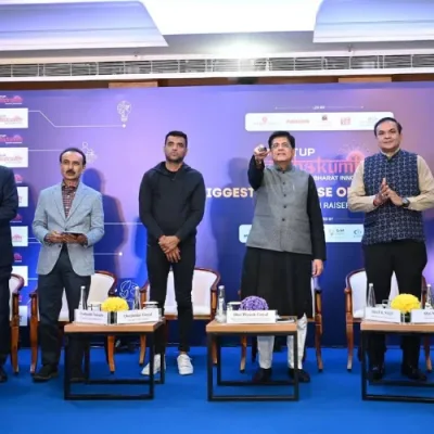 A diverse group of people gather at a conference, symbolizing the coming together of startups, investors, and stakeholders at the Startup Mahakumbh event in India.