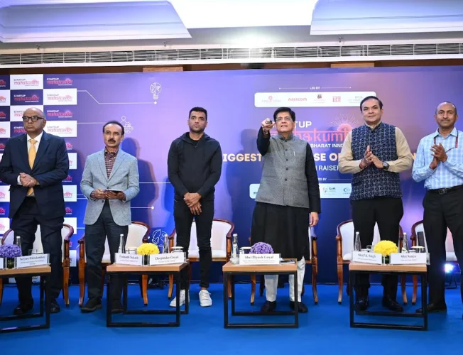 A diverse group of people gather at a conference, symbolizing the coming together of startups, investors, and stakeholders at the Startup Mahakumbh event in India.
