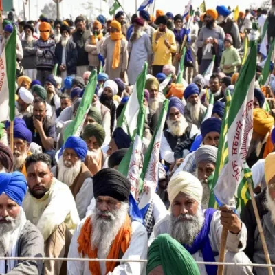 Split image: Farmers protesting on highway, farmer leader speaking at gathering.