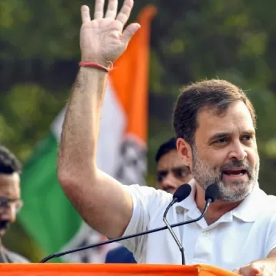 Split image: Rahul Gandhi at Bharat Jodo Yatra, Uddhav Thackeray at Shiv Sena rally.