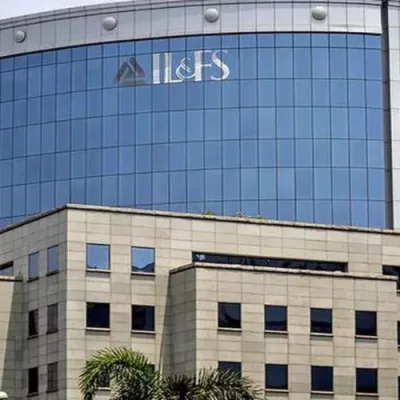 Gavel striking down on "Wilful Defaulter" with IL&FS logo.