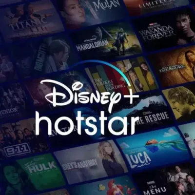 Hotstar logo displayed on a digital device screen with increasing subscriber numbers graph in the background.