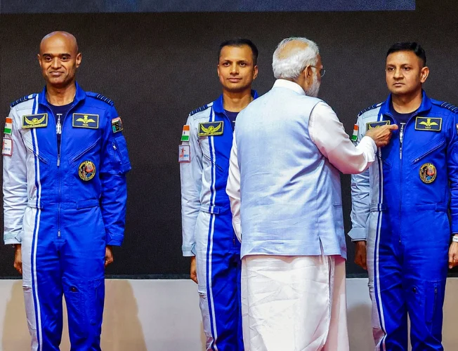 Group photo of the four Gaganyaan astronauts in their official uniforms.