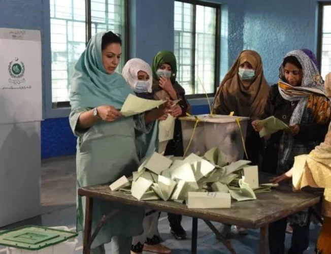 Citizens in Pakistan protesting against delayed election results amid allegations of rigging and violence.