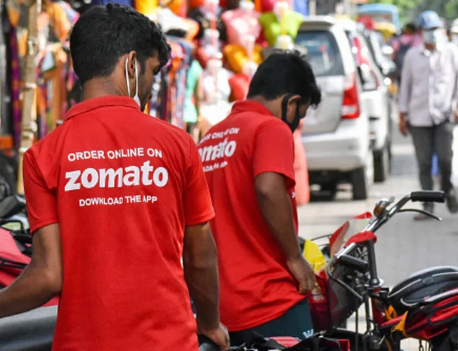 Line graph showing Zomato's food-delivery gross order value (GOV) increasing despite a decline in overall spending, with restaurants joining Zomato platform highlighted.