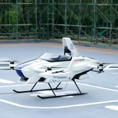 Mockup or prototype of an electric vertical take-off and landing (eVTOL) aircraft, representing Suzuki and SkyDrive's collaboration.