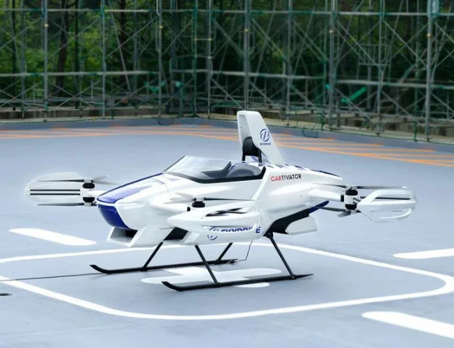 Mockup or prototype of an electric vertical take-off and landing (eVTOL) aircraft, representing Suzuki and SkyDrive's collaboration.