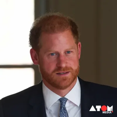 This illustration symbolizes Prince Harry's decision to renounce his British residency and declare the United States as his new home. The background features a map of the US, highlighting the Duke of Sussex's transition to a new chapter in his life.