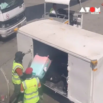 Video footage captures Air India staffers carelessly throwing passenger's luggage and musical instruments, raising concerns about safety and security.