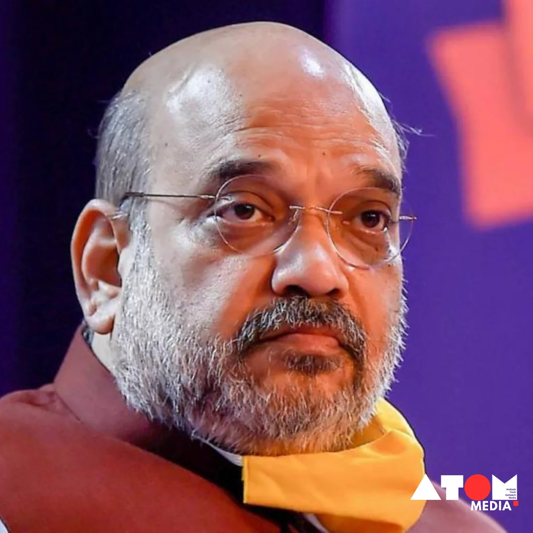 The image captures the fervor of the Lok Sabha Election campaign as political candidates address a crowd during a rally, rallying support for their respective parties and agendas. Amit Shah