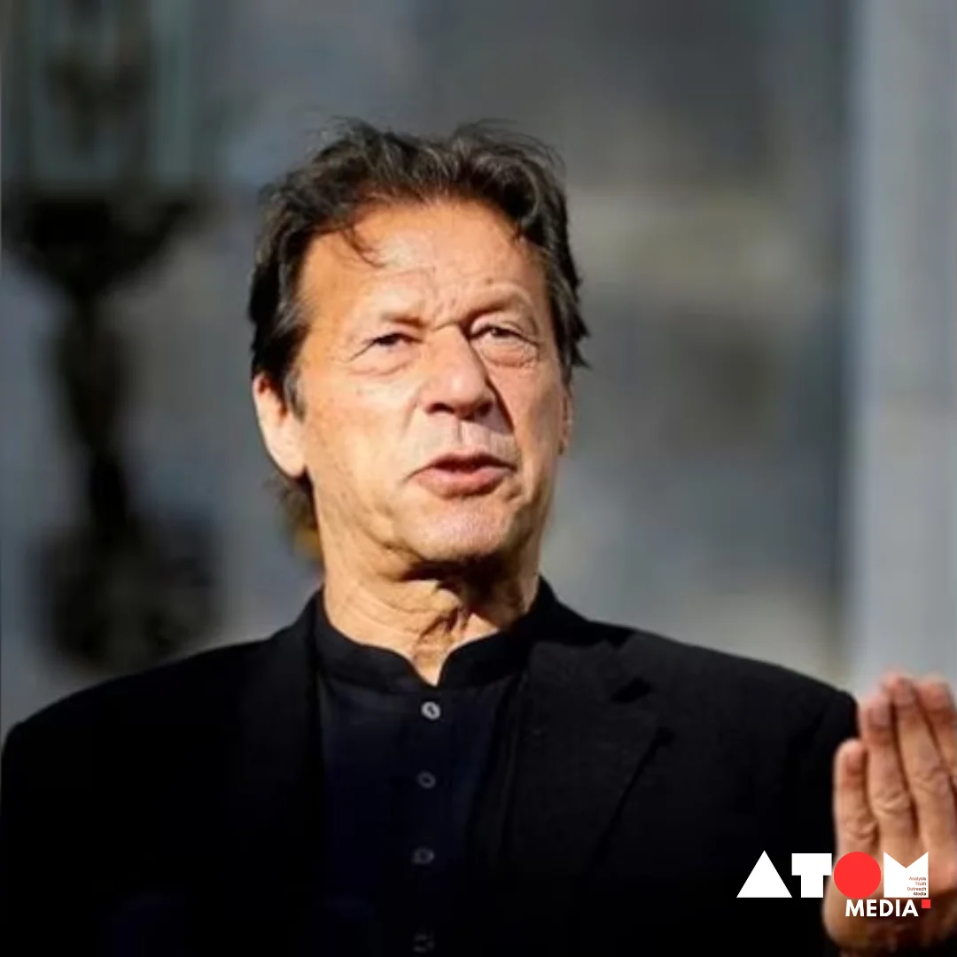 Imran Khan, the former Prime Minister of Pakistan, delivers a speech at a podium during a political event, highlighting the political dynamics and legal challenges he faces.
