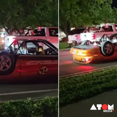 The image captures the intriguing sight of a car cruising with its wheels suspended in mid-air, creating a mesmerizing illusion of defying gravity.