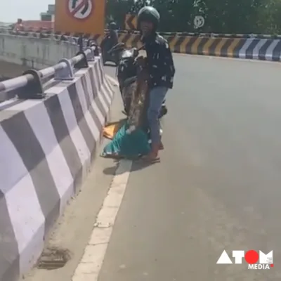 The image captures a distressing moment as a man is seen physically assaulting his wife on a bridge in Chennai. This incident highlights the pervasive issue of domestic violence and the urgent need for societal intervention to ensure the safety and security of individuals, particularly women, in public spaces.