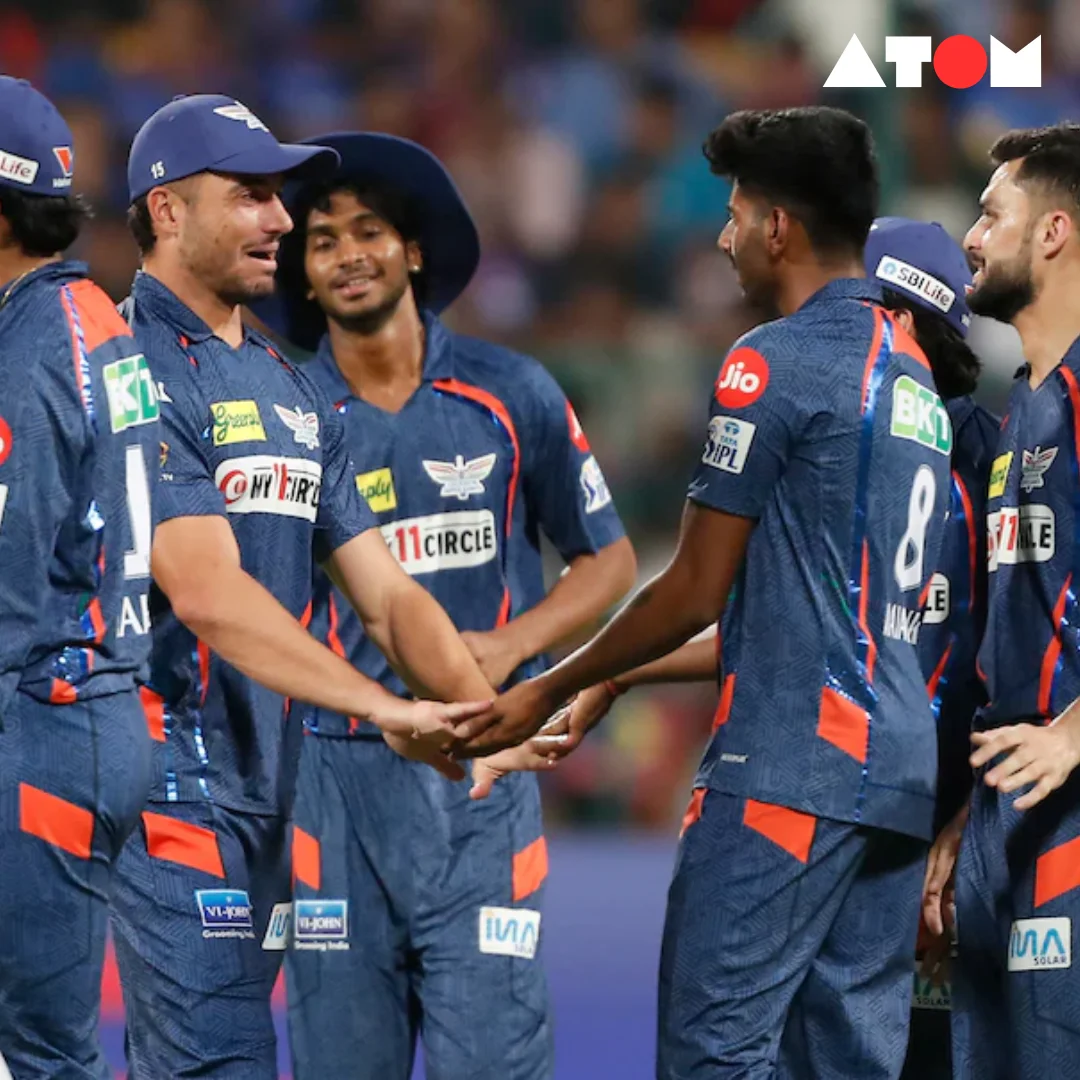 Mayank Yadav celebrating with teammates after taking a wicket