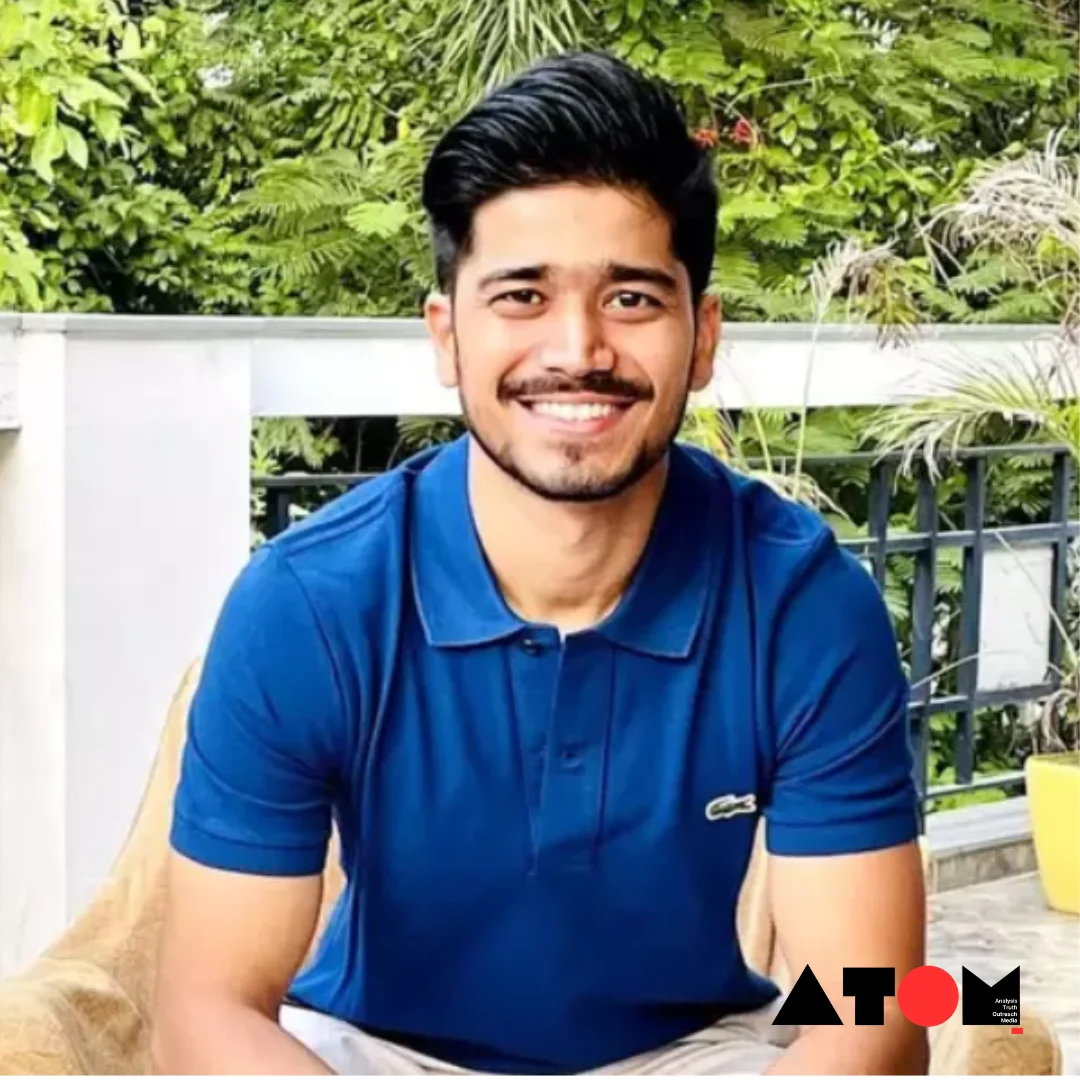 Azhar Iqubal and Deepit Purkayastha shaking hands in a boardroom