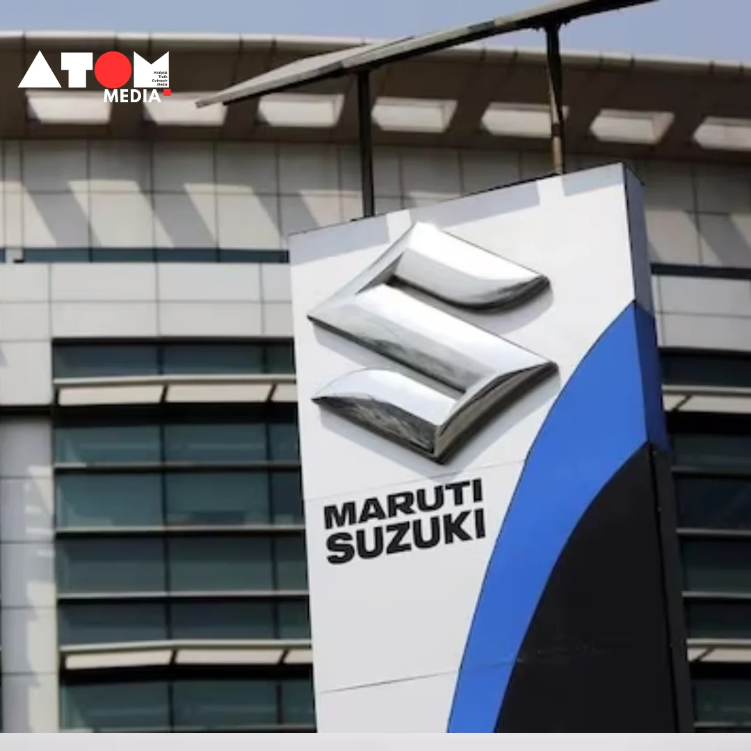 Maruti Suzuki logo displayed on a backdrop of stock market performance charts, symbolizing the company's record-high share price amid capacity expansion.