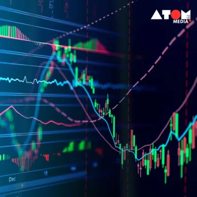 The image depicts a dynamic stock market scene with rising and falling stock symbols, reflecting the volatility and activity in the market.