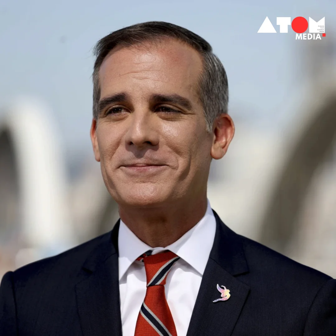 The image captures Eric Garcetti, the United States Ambassador to India, delivering a speech at an event in Delhi, where he advocates for India's future and emphasizes the strong Indo-American ties.