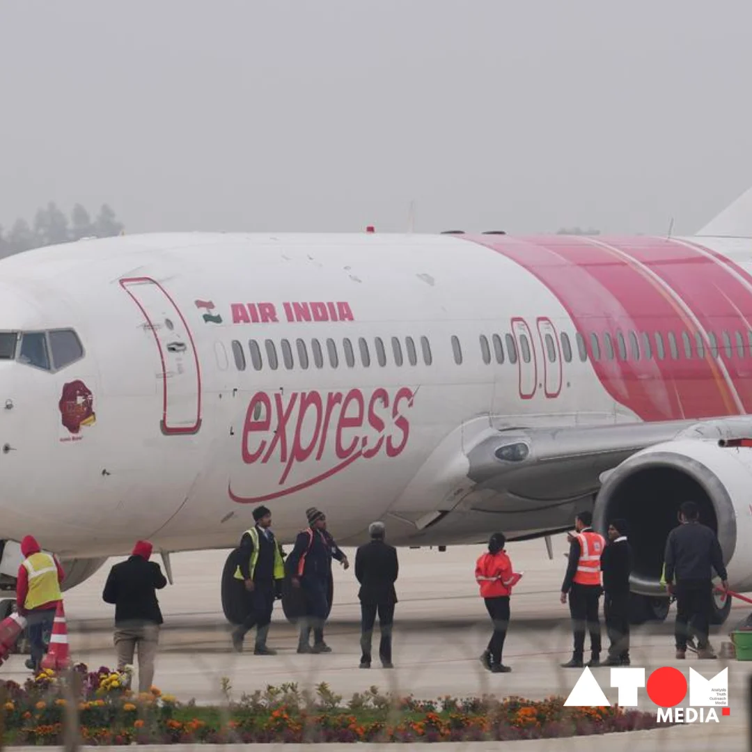 Image of passengers waiting at an airport terminal due to flight cancellations.