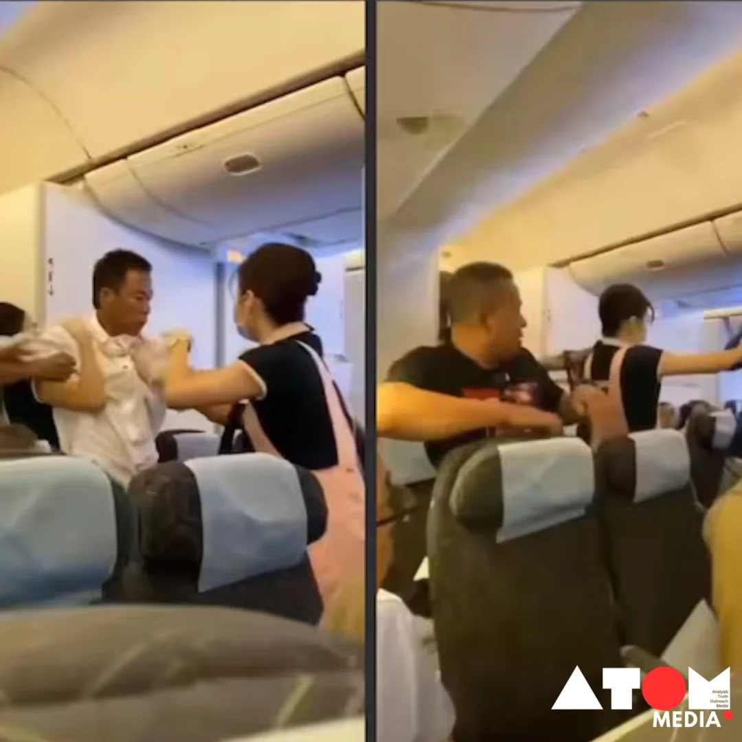 Image depicts two passengers engaged in a physical altercation aboard an aircraft, with flight attendants attempting to intervene.