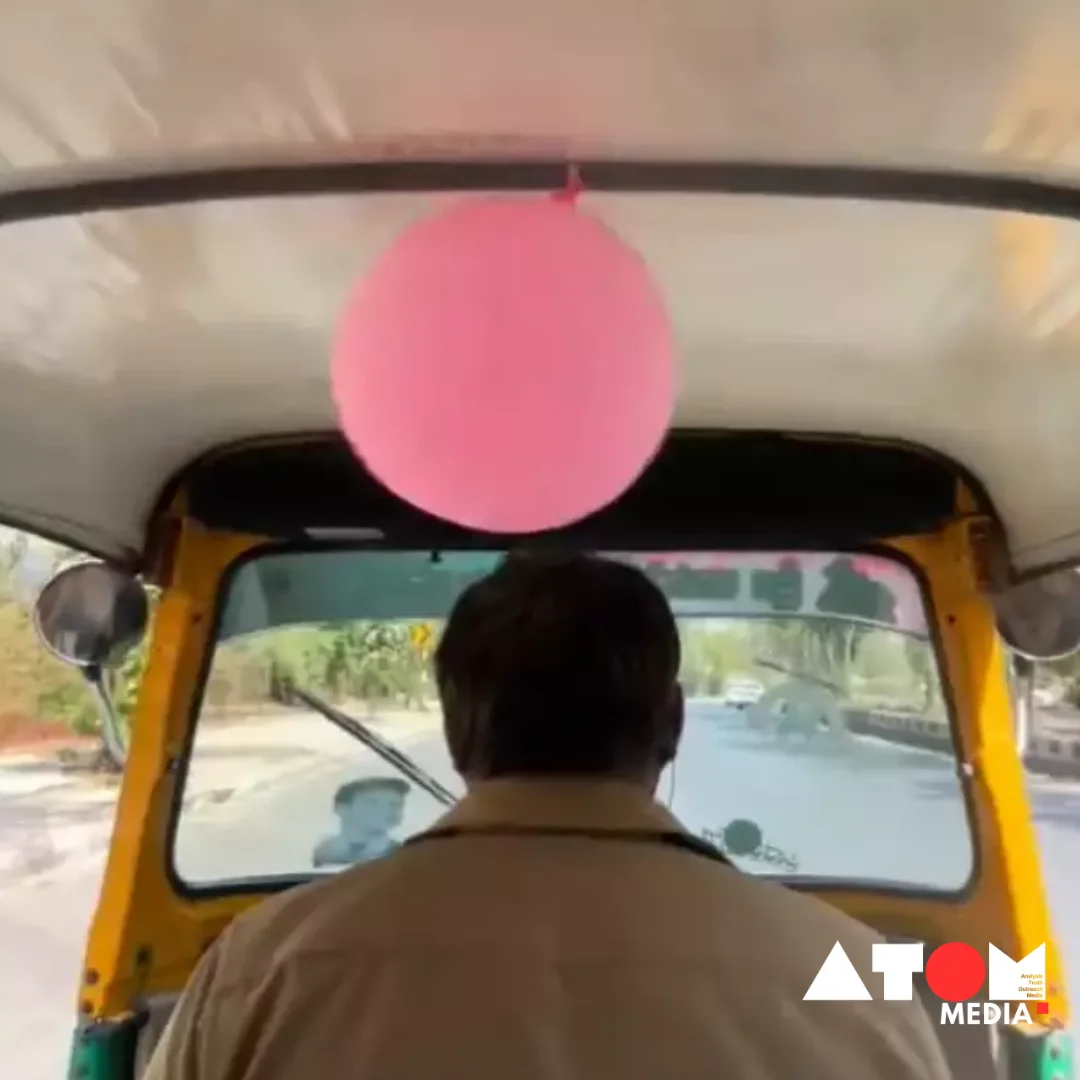 : The image captures the heartwarming moment when a Bengaluru auto driver decorates his vehicle with pink balloons to celebrate his daughter's birthday, capturing the essence of fatherly love and affection.