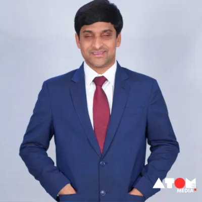 The image portrays Srikanth Bolla, a blind entrepreneur, whose inspiring journey is set to be depicted in a biographical film starring Rajkummar Rao. Despite facing rejection and adversity, Bolla fought for his right to education and went on to become a successful entrepreneur, earning recognition from the World Economic Forum.