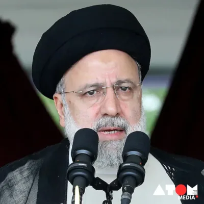 Helicopter wreckage in mountainous region following crash that killed Iran's President and Foreign Minister.