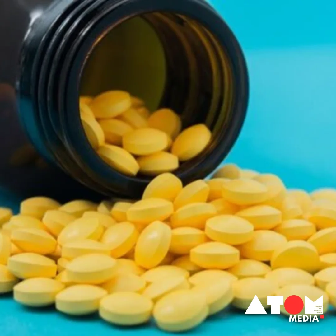 Image depicts a person holding a container of Vitamin D supplement pills, highlighting the importance of avoiding common mistakes to maximize the benefits of Vitamin D intake.