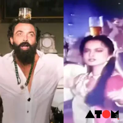 Image captures Rekha's timeless elegance as she effortlessly balances a glass on her head while dancing in the 1988 film 'Biwi Ho To Aisi'. This iconic scene predates Bobby Deol's similar act in 'Animal' by 35 years, showcasing Rekha's status as a trendsetter in Bollywood.