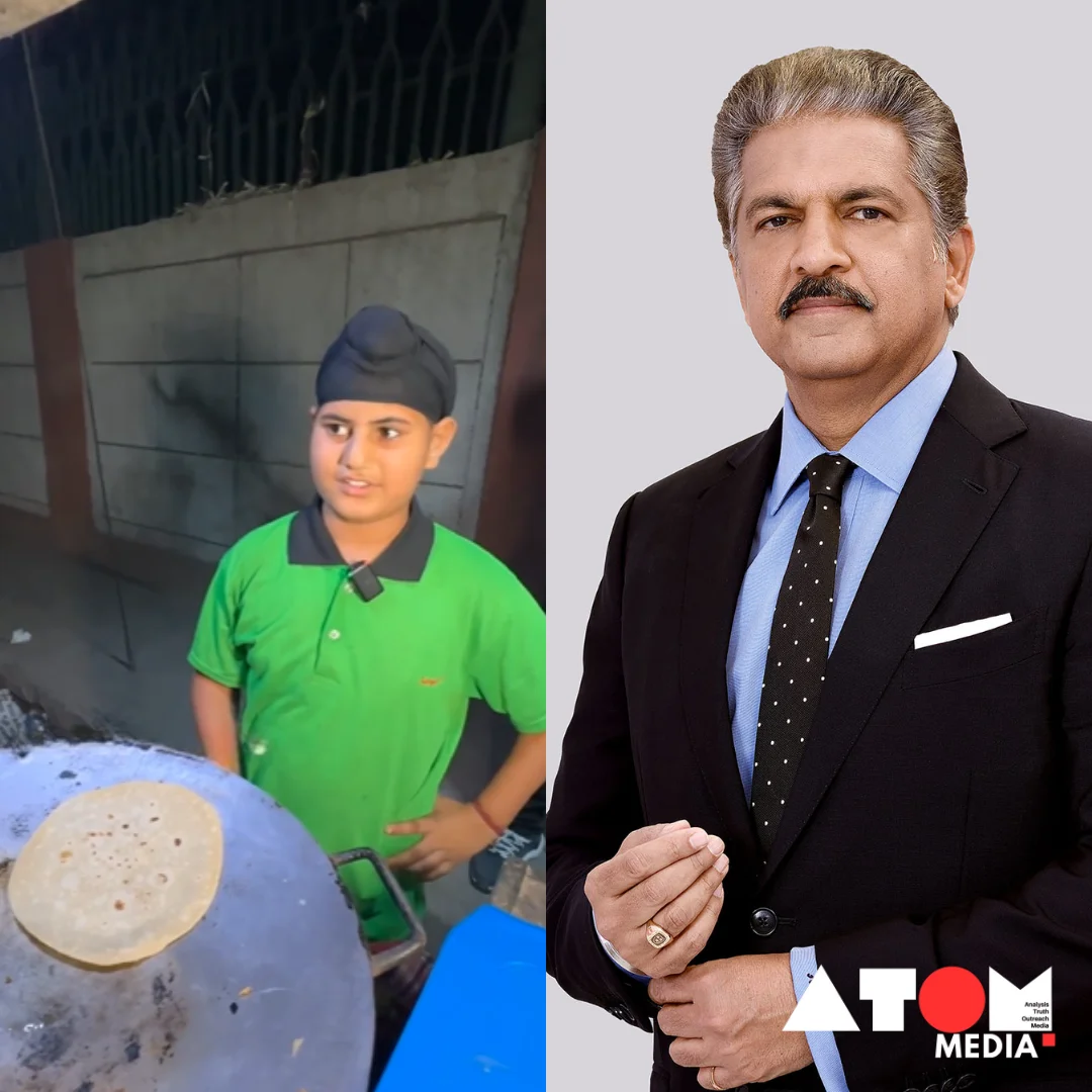 The image shows Anand Mahindra, industrialist and philanthropist, watching the viral video of Jaspreet, a 10-year-old Delhi boy, selling rolls. Mahindra has offered support to Jaspreet, particularly for his education, after learning about his story.
