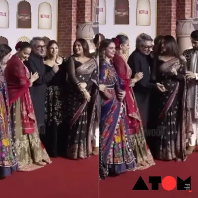 Sanjay Leela Bhansali greets Richa Chadha while his niece, Sharmin Segal, stands nearby at the premiere event of Heeramandi.