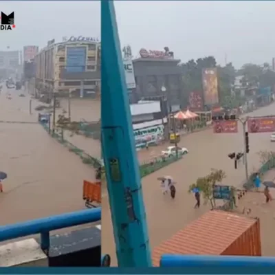 Flooded streets near Lulu Mall in Kochi, Kerala, following heavy rains, causing significant traffic disruptions and sparking public outrage over poor drainage and urban planning.