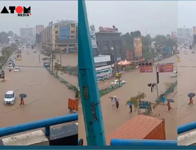 Flooded streets near Lulu Mall in Kochi, Kerala, following heavy rains, causing significant traffic disruptions and sparking public outrage over poor drainage and urban planning.