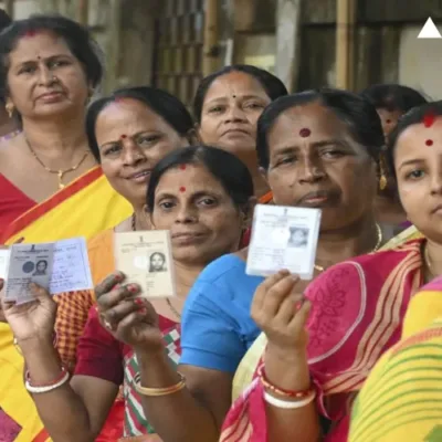 Women standing in line to vote at a polling station in Maharashtra during the 2024 Lok Sabha elections.