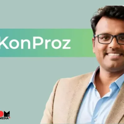 The image shows KonProz founders Piyush Chopra and Shiladitya Dash smiling and holding a symbolic check or celebrating their recent $700K funding round. This investment will be used to develop generative AI technologies tailored for the legal, tax, and regulatory sectors in India.