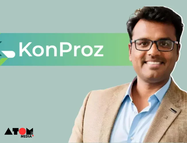 The image shows KonProz founders Piyush Chopra and Shiladitya Dash smiling and holding a symbolic check or celebrating their recent $700K funding round. This investment will be used to develop generative AI technologies tailored for the legal, tax, and regulatory sectors in India.