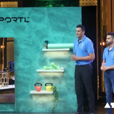 The image depicts the triumphant moment of Portl's founders, Indraneel Gupta, Vishal Chandapeta, and Armaan Kandhari, celebrating their successful $3 million pre-Series A funding round.