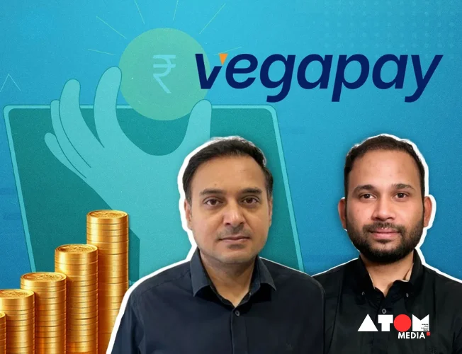 Vegapay team celebrating their $5.5 million funding success, with a digital interface showcasing their fintech solutions in the background.