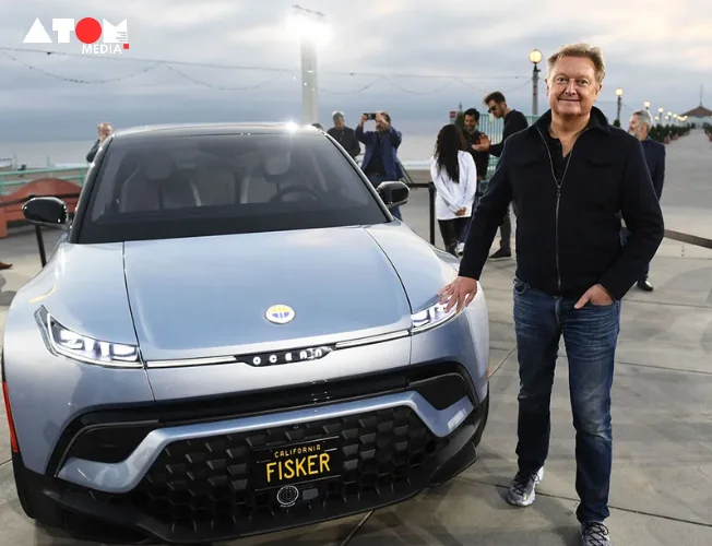 Henrik Fisker with the Fisker Ocean electric vehicle at the Manhattan Beach Pier.