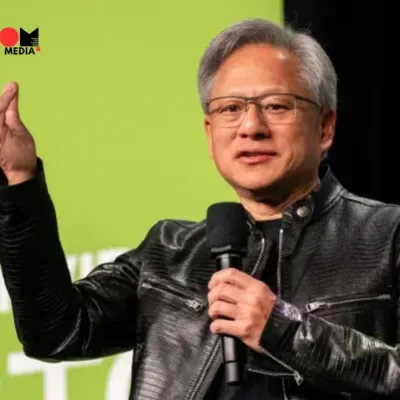 A headshot of Jensen Huang, CEO of Nvidia, with a thoughtful expression.