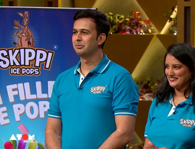 Skippi Ice Pops logo with a rupee symbol and a growth chart.