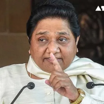 n this image, BSP leader Mayawati is seen addressing a large gathering of supporters during the Lok Sabha election campaign in Uttar Pradesh. Her influence and the strategic decisions of the BSP played a crucial role in the election dynamics, particularly affecting the results of the BJP and the INDIA bloc.